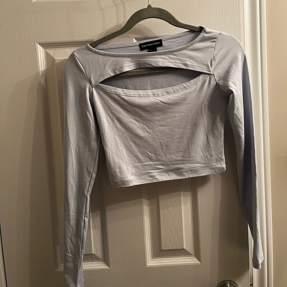 Forever 21 long sleeve crop top wirh chest slit.